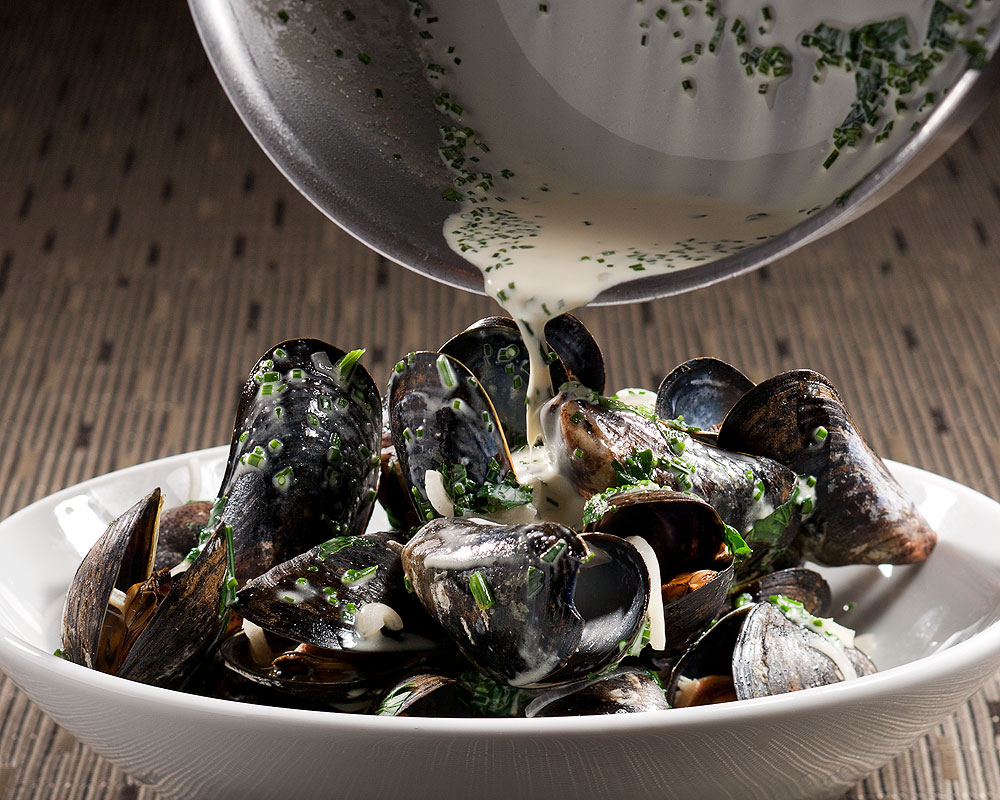 Mussels in white bowl